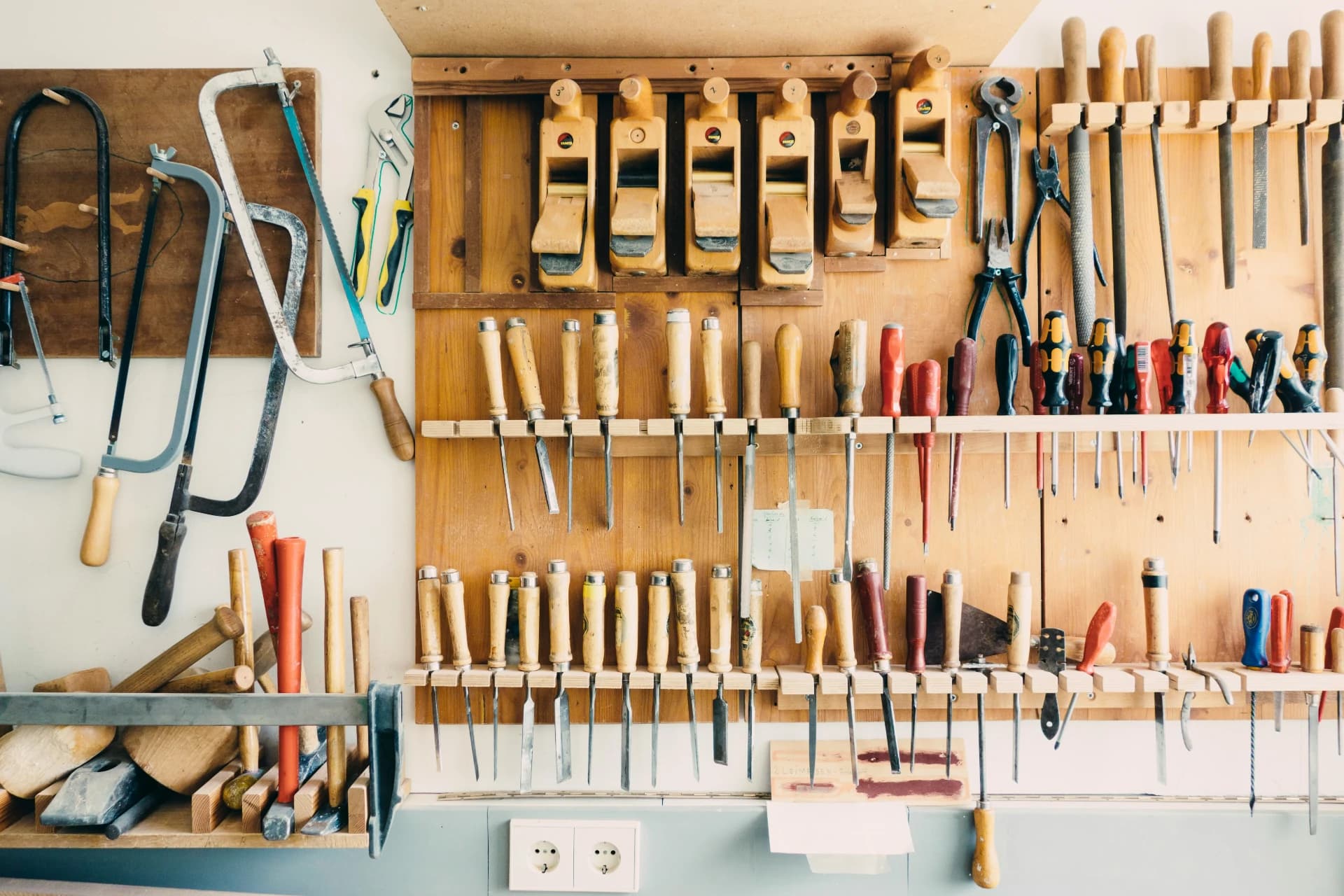 A workbench with many tools